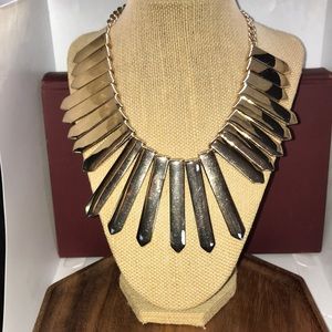 Gold colored necklace